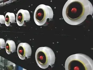 Dispositivo de alimentación de elastano