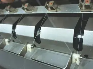 Sistema de lubricación del hilo